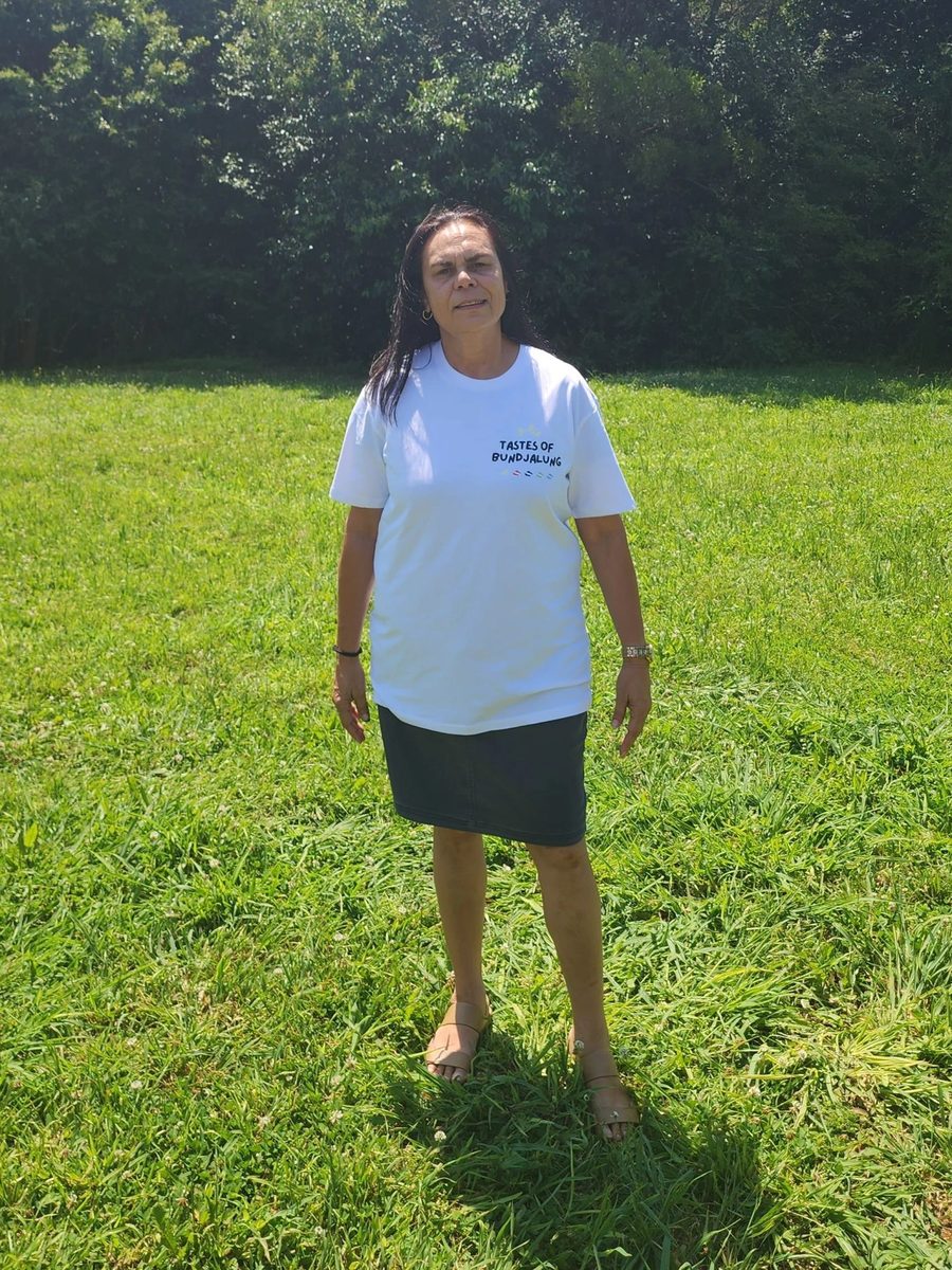 Community member wearing the back design shirt at Namabunda Farm
